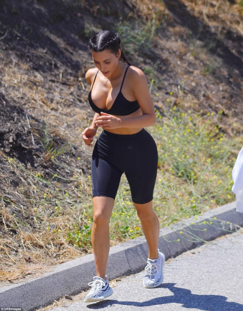 PICTURE EXCLUSIVE: Slimmed down Kim Kardashian shows off her taut figure in skimpy bra top and shorts on grueling hike